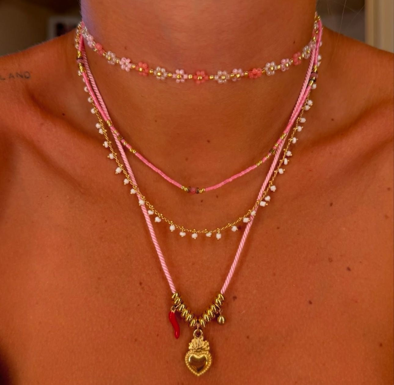 Collana cordone cuore sacro
