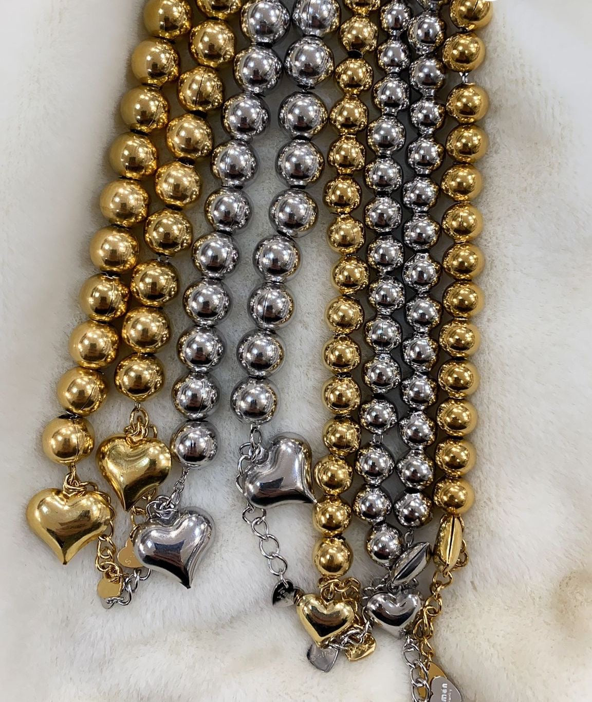 Bracciale Praline (con rumore del sonaglio)