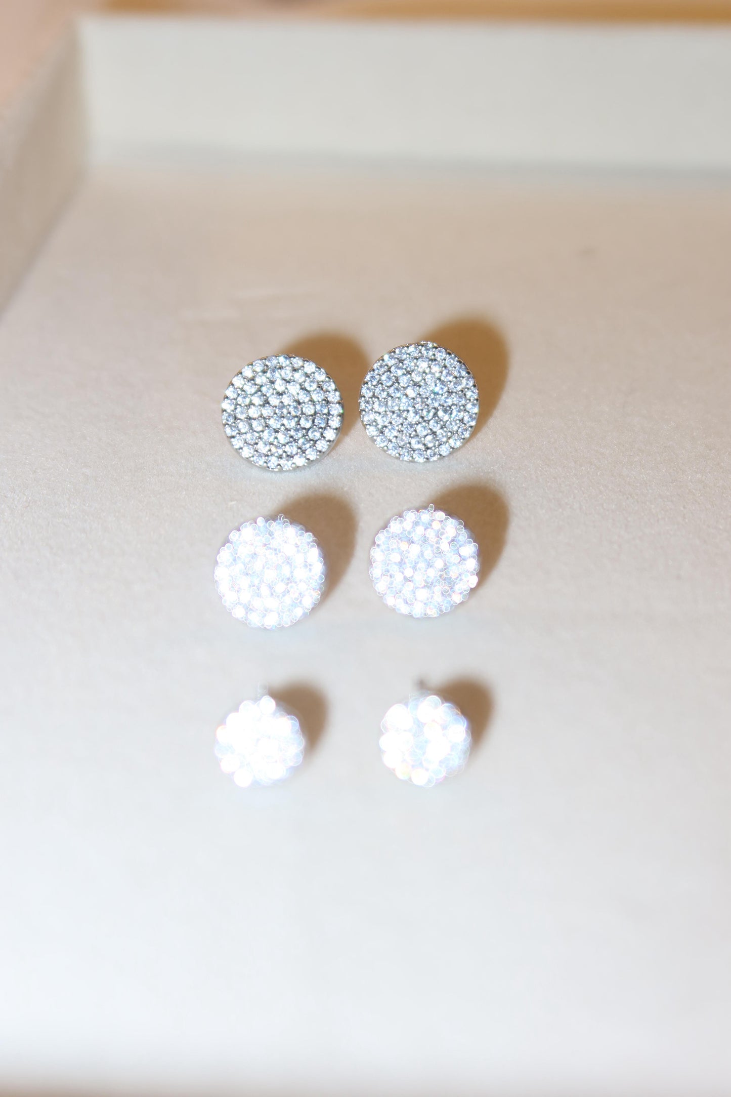 Orecchini punti luce tondi Pavè